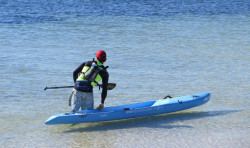 Travis Grant with his new NSP board... Travis Grant and his new NSP SUP race board (© Alain Teurquetil)